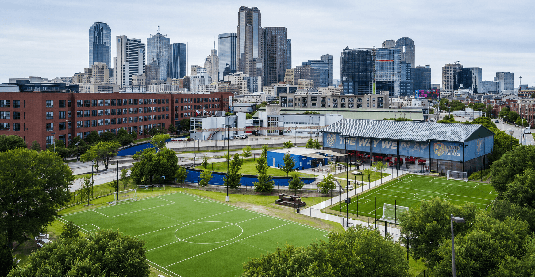 Downtown Dallas skyline over the pitch